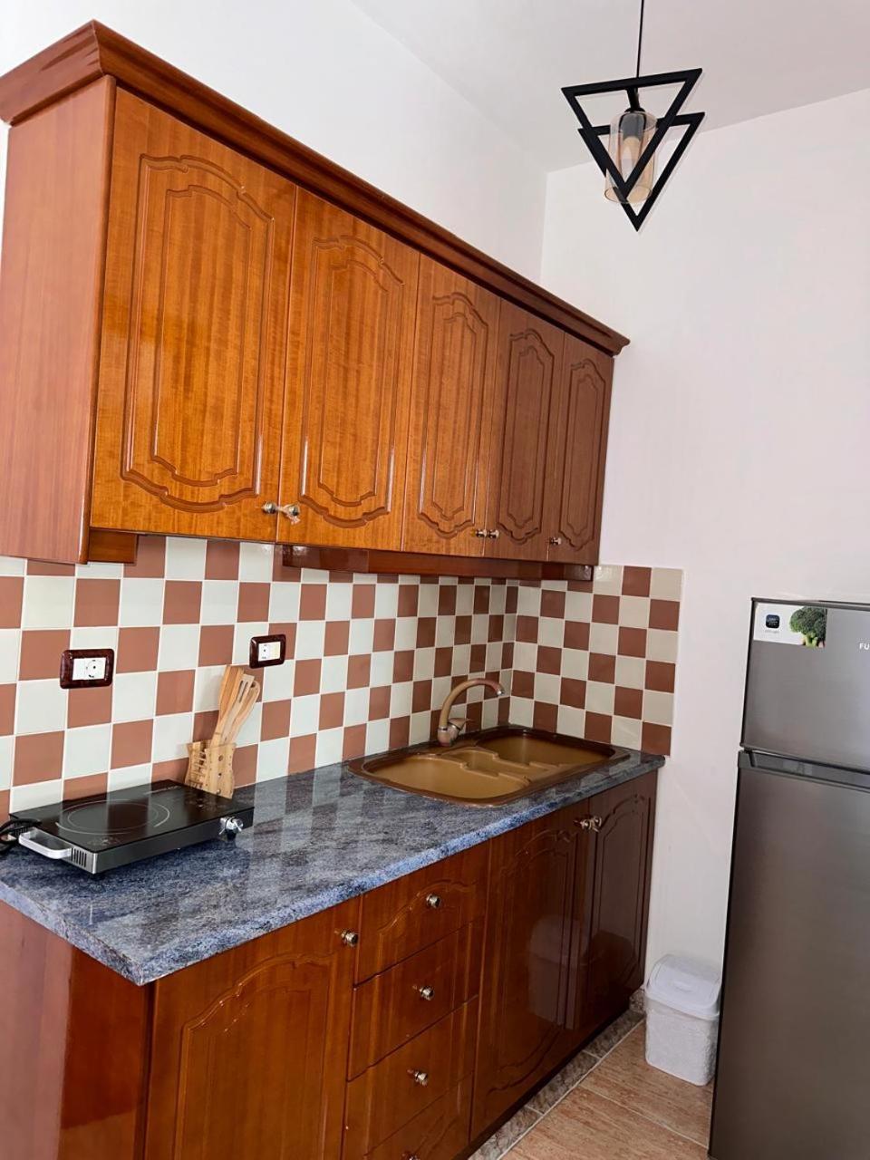 Kenza Apartments Sarande Bagian luar foto